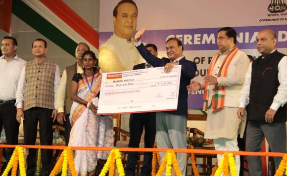Chief Minister Dr Himanta Biswa Sarma handing over cheques to Tea workers' families of Doloo Tea Estate at Cachar district.