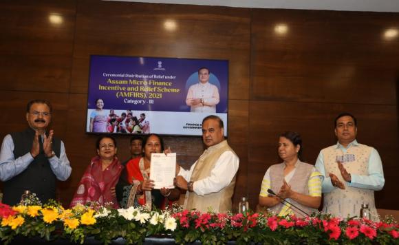 CM Dr. Himanta Biswa Sarma at the Ceremonial Distribution of Relief to beneficiaries under AMFIRS 2021 Category - III