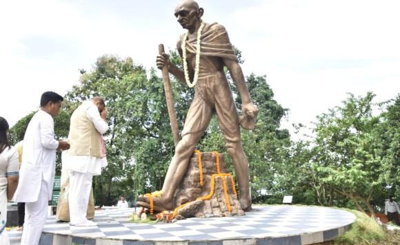CM Dr. Himanta Biswa Sarma paying floral tributes to Father of the Nation Mahatma Gandhi at Gandhi Mandap in Guwahati.