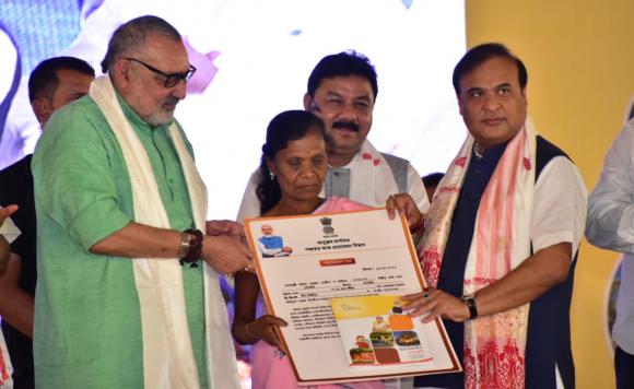 Chief Minister Dr. Himanta Biswa Sarma is presenting sanction letters to the beneficiaries for houses under PMAY (G) at a...